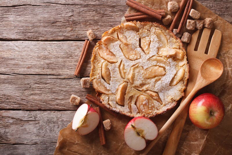 Dutch baby pancake with apple on a paper. horizontal top view