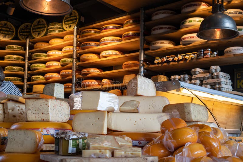 Dutch cheeses, edam, gouda, whole round wheels in a cheese store in Rotterdam, Netherlands royalty free stock image Dutch cheeses, edam, gouda, whole round wheels in a cheese store in Rotterdam, Netherlands royalty free stock image