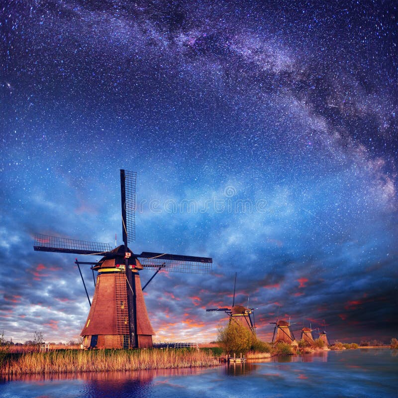 Dutch mill at night. Starry sky. Holland. Netherlands stock photography