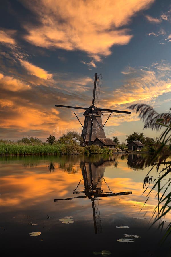 Dutch mill during sunset stock photos