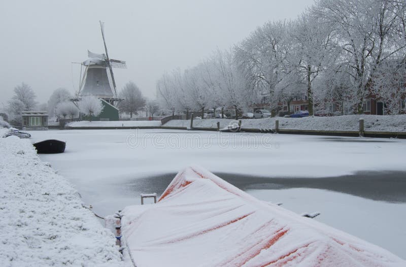 Dutch mill in winter in Zwolle stock photography