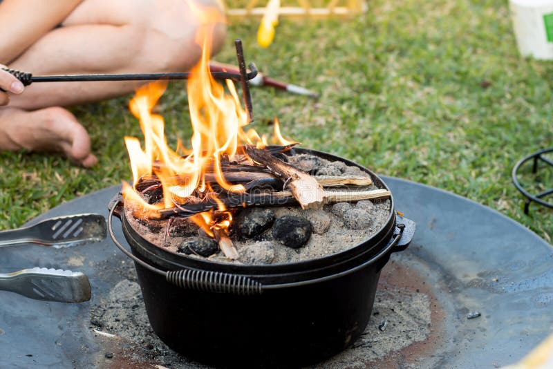 Dutch Oven in Camp Fire stock photo. Image of tripod - 49018300