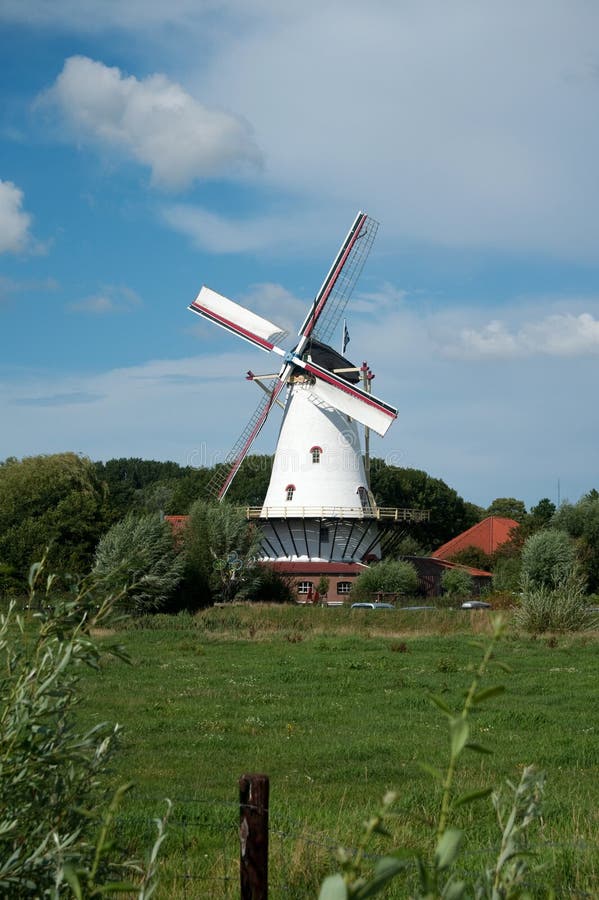 Old Dutch Windmill on a Dike. Stock Image Image of heritage, spinning