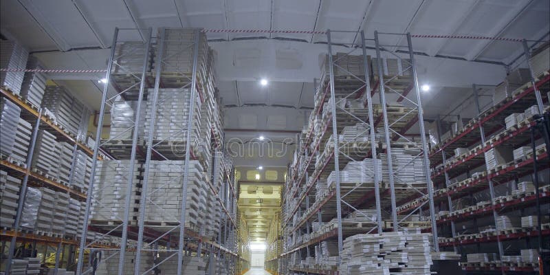 Large storage shelves. Warehouse of wooden products. A large warehouse with products from the DCS. Large storage shelves. Warehouse of wooden products. A large warehouse with products from the DCS.