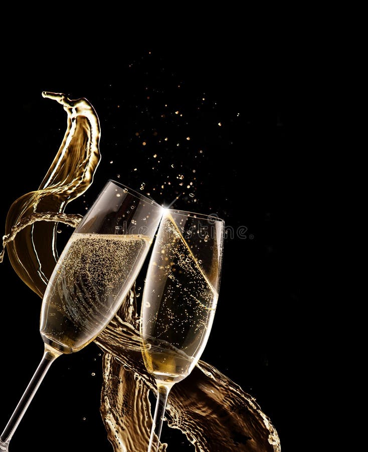 Two glasses of champagne with splash over black background. Celebration concept, free space for text. Two glasses of champagne with splash over black background. Celebration concept, free space for text