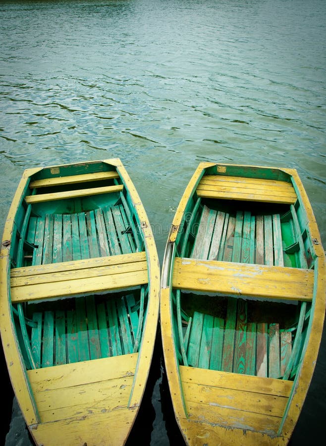 Two wooden old boats berth. Two wooden old boats berth