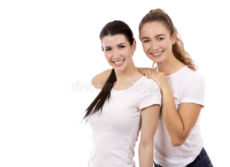 Dwa żeńskiego przyjaciela na białym tle