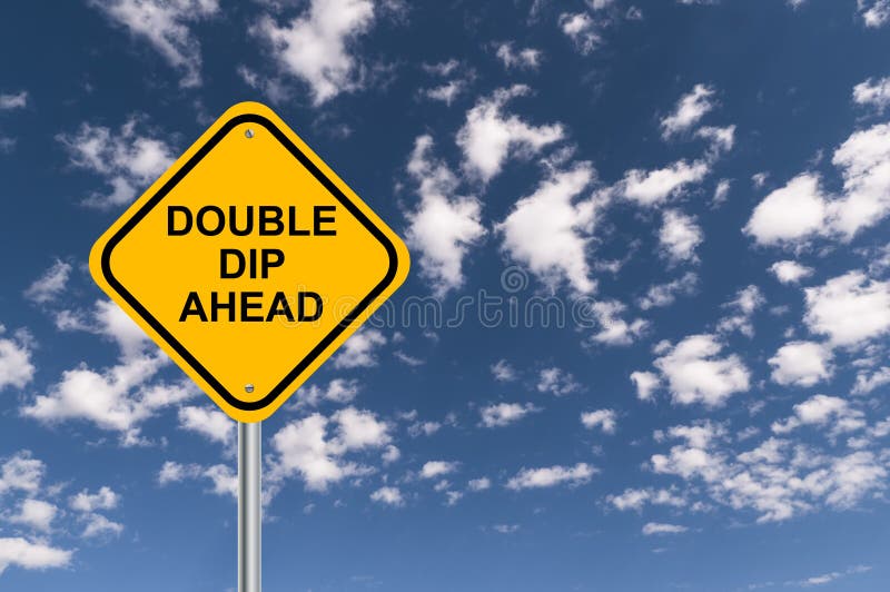 Double dip ahead sign against blue cloudy sky. Double dip ahead sign against blue cloudy sky.