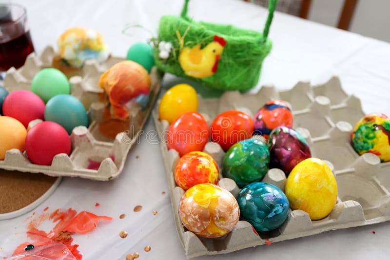 Dye or Dyeing Easter Eggs. Coloring and Painting Easter Eggs Stock