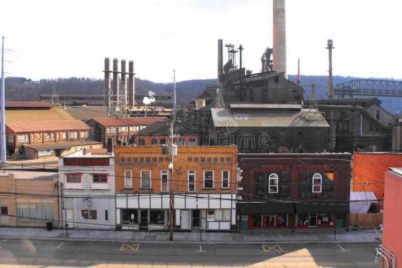A dying steel town. Dead steel mill and downtown at Mingo Junction, Ohio. This was once a major hot metal steel mill for Wheeling-Pittsburgh Steel Co., later stock photography A dying steel town. Dead steel mill and downtown at Mingo Junction, Ohio. This was once a major hot metal steel mill for Wheeling-Pittsburgh Steel Co., later stock photography