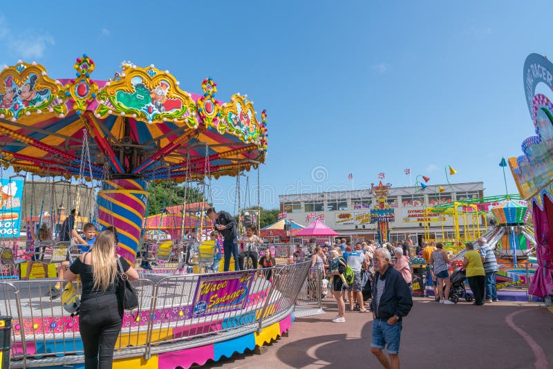 Dymchurch England - August 19 2019; Amusement Park people and families attracted to the promised fum.1. Dymchurch England - August 19 2019; Amusement Park people and families attracted to the promised fum.1