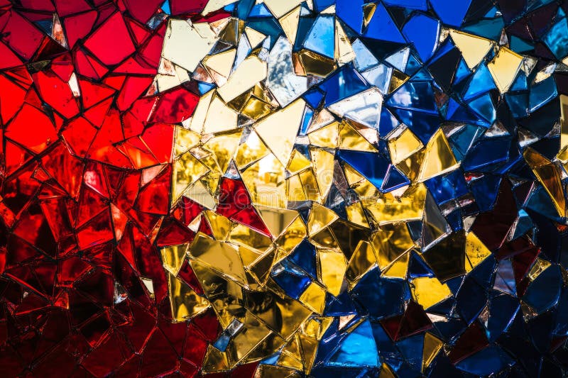 A dynamic, colorful abstract background inspired by shattered glass reflections. The fragmented royalty free stock photo