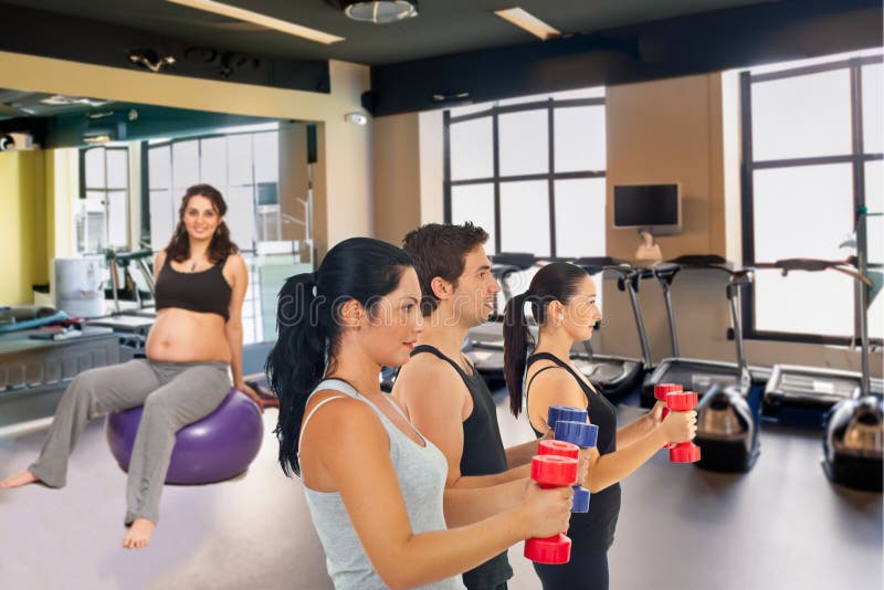 Group Fitness Class: Active Young Adults Strengthening Vitality with Weight Training stock images