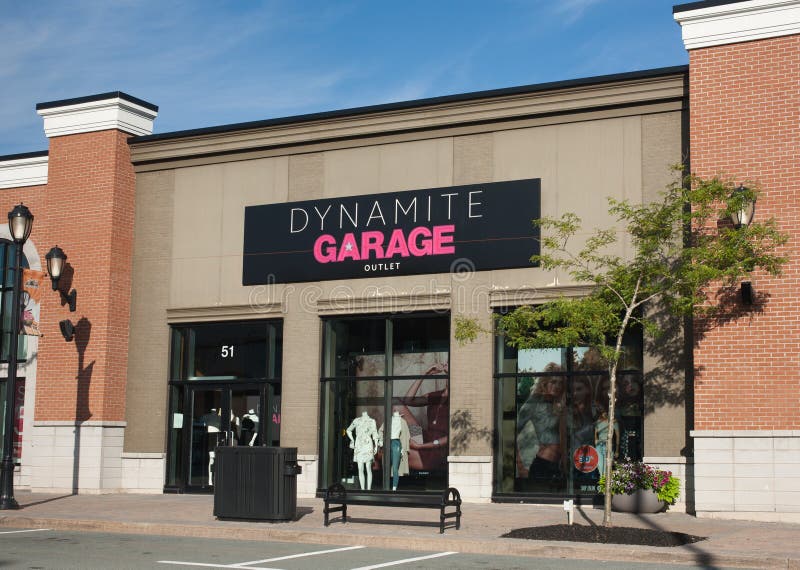 DARTMOUTH, CANADA - JULY 31, 2016: Dynamite Garage clothing store outlet. Groupe Dynamite is a Canada based clothing company founded in 1975. DARTMOUTH, CANADA - JULY 31, 2016: Dynamite Garage clothing store outlet. Groupe Dynamite is a Canada based clothing company founded in 1975.