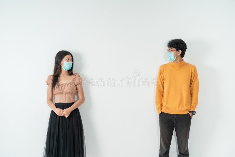 Social distancing. people with masks keep their distance during virus symptoms. Social distancing. people with masks keep their distance during virus symptoms