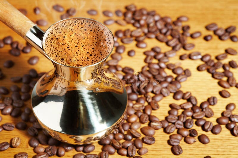 Turkish coffee pot and coffee beans. Turkish coffee pot and coffee beans