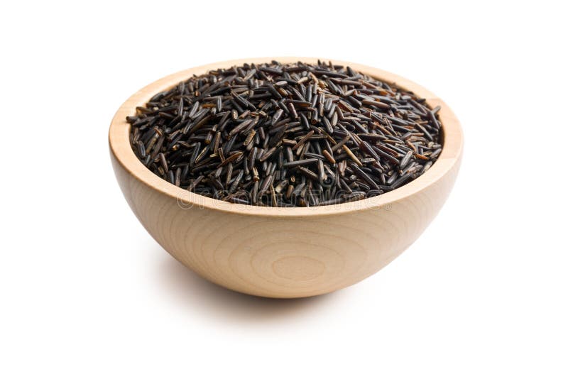 Wild rice in wooden bowl on white background. Wild rice in wooden bowl on white background