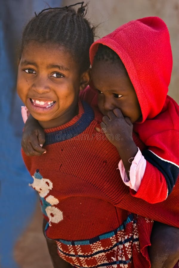 Deprived African children, village near Kalahari desert, people diversity series. Deprived African children, village near Kalahari desert, people diversity series