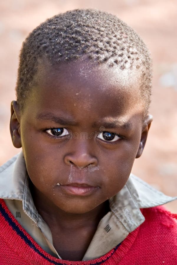 Deprived African child, village near Kalahari desert, people diversity series. Deprived African child, village near Kalahari desert, people diversity series