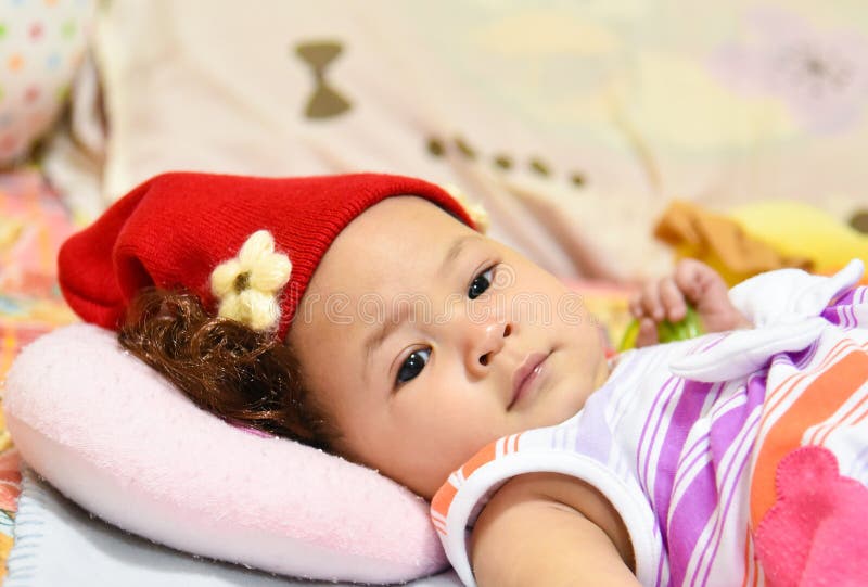 Dziecko czerwieni kapelusz zdjęcie stock