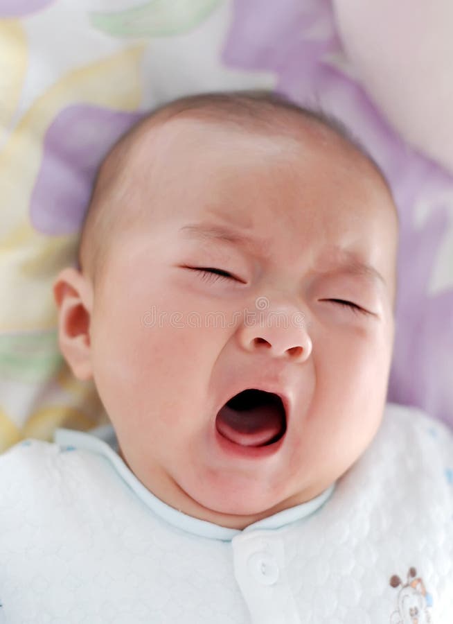 A 5 months old Asian baby boy crying. A 5 months old Asian baby boy crying