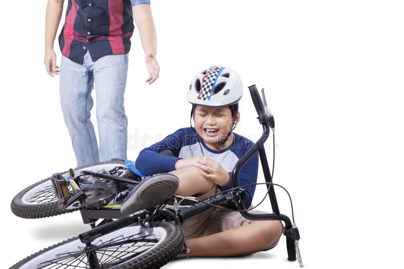 Wounded child falling from his bike and crying while holding his knee with dad coming to help, isolated on white. Wounded child falling from his bike and crying while holding his knee with dad coming to help, isolated on white