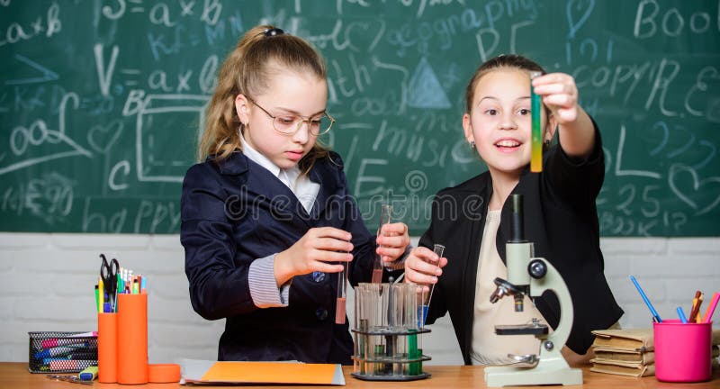 Girls School Uniform Busy With Proving Their Hypothesis. Private School