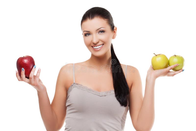 Dziewczyna z jabłkami fotografia stock Dziewczyna z jabłkami fotografia stock