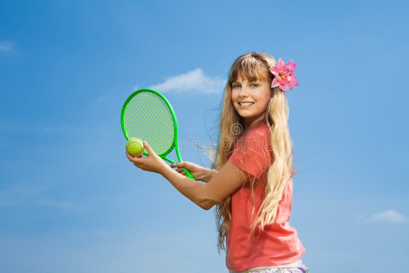 Dziewczyna z tenis rakietą zdjęcia stock Dziewczyna z tenis rakietą zdjęcia stock