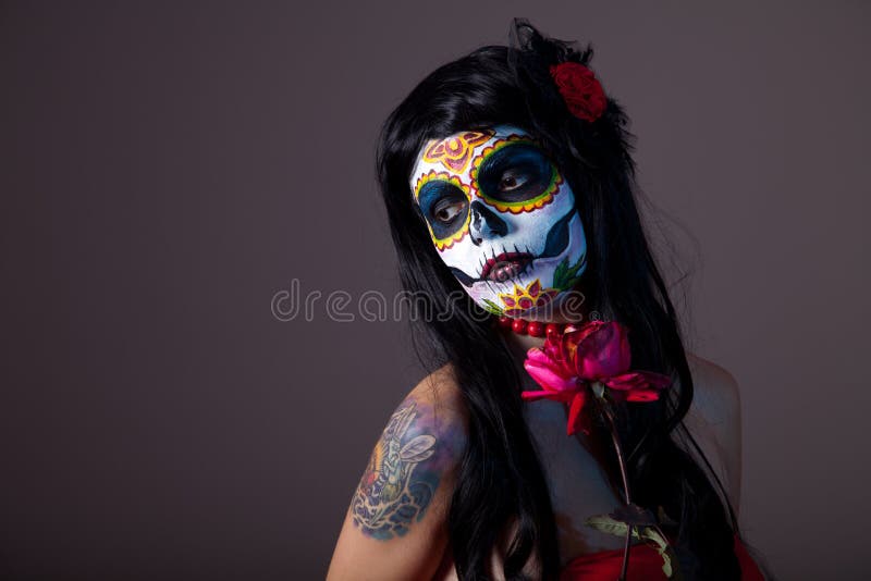 Sugar skull girl with red rose, professional body-art. Sugar skull girl with red rose, professional body-art