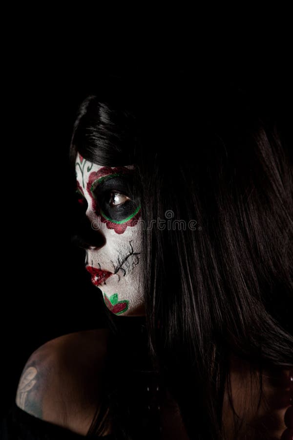 Portrait of Sugar skull girl, isolated on black background. Portrait of Sugar skull girl, isolated on black background
