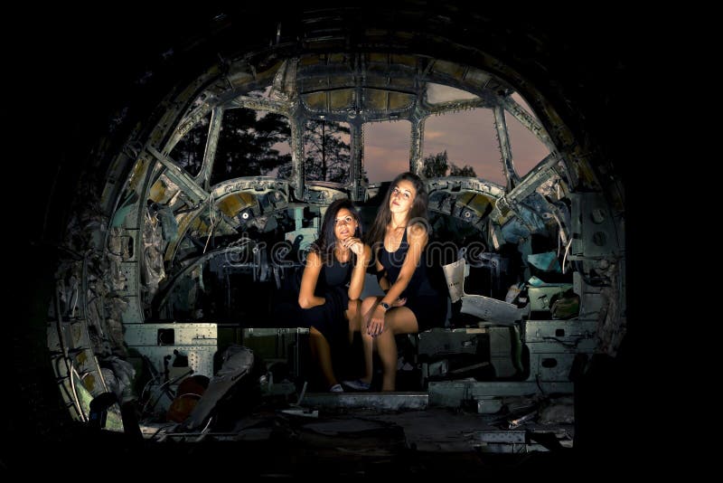 Girls in the ruined airplane. Girls in the ruined airplane