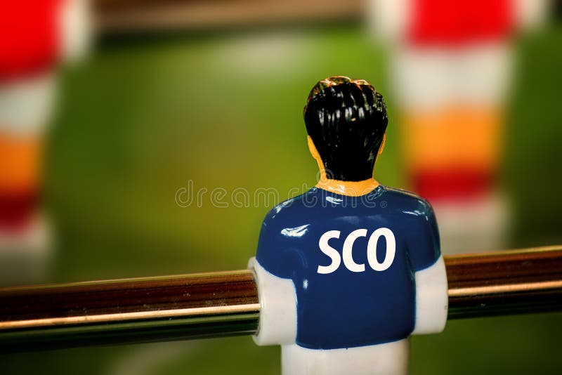 Débardeur national de l'Ecosse sur le vintage Foosball, jeu de football de Tableau photographie stock libre de droits Débardeur national de l'Ecosse sur le vintage Foosball, jeu de football de Tableau photographie stock libre de droits