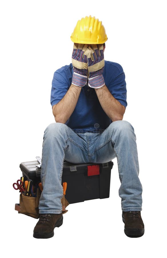 Desperate young handyman sit on his toolbox. Desperate young handyman sit on his toolbox