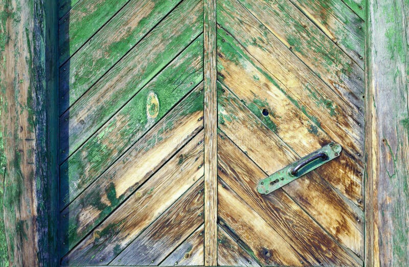 Détail de vieille porte en bois dans un style rustique photos stock Détail de vieille porte en bois dans un style rustique photos stock
