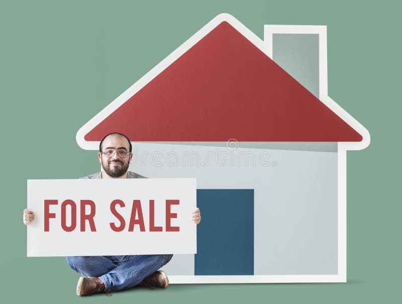 Man holding poster with house mockup