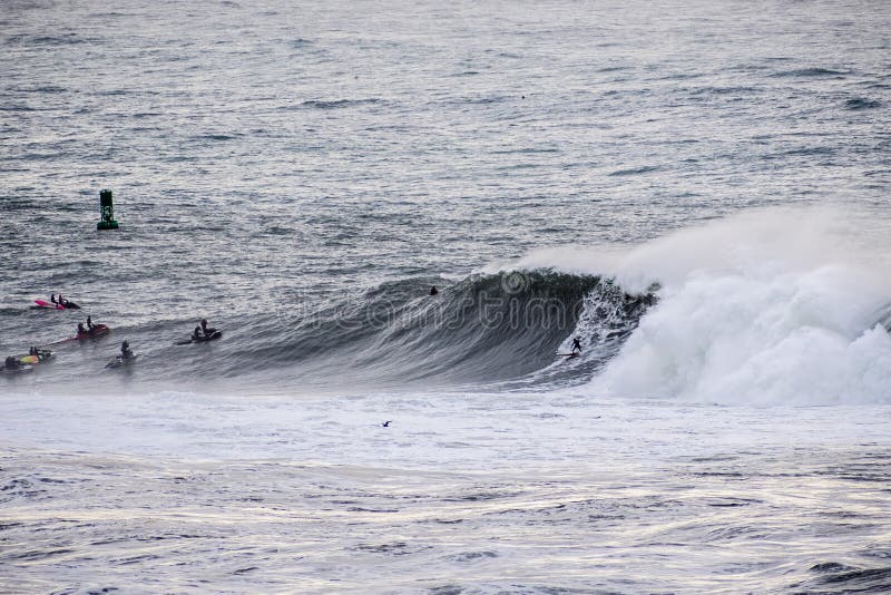 Surfers Riding Huge Waves on the West Coast, Close To Pillar Point and