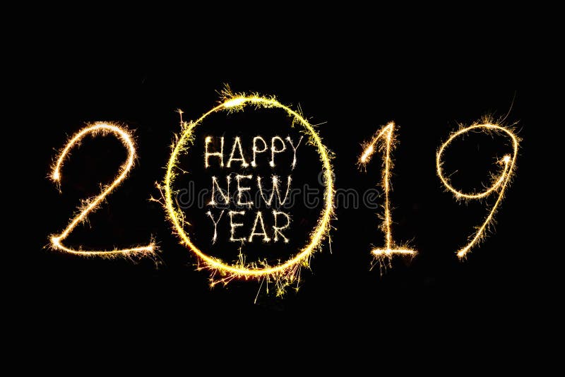 Happy New Year 2019 text hand written sparkles fireworks. Happy New Year 2019 text hand written sparkles fireworks.