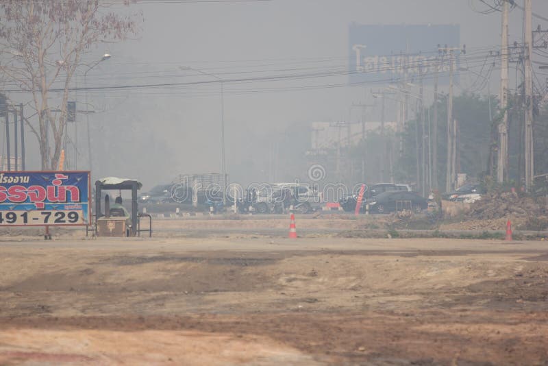 Chiangmai, Thailand - March 16 2019: Smoke and Pollution Haze on highway Chiangmai road 25 air asia asian car city danger day downtown dust emissions environment jam people pm polluted smog street traffic transport transportation truck trucks vehicle worst