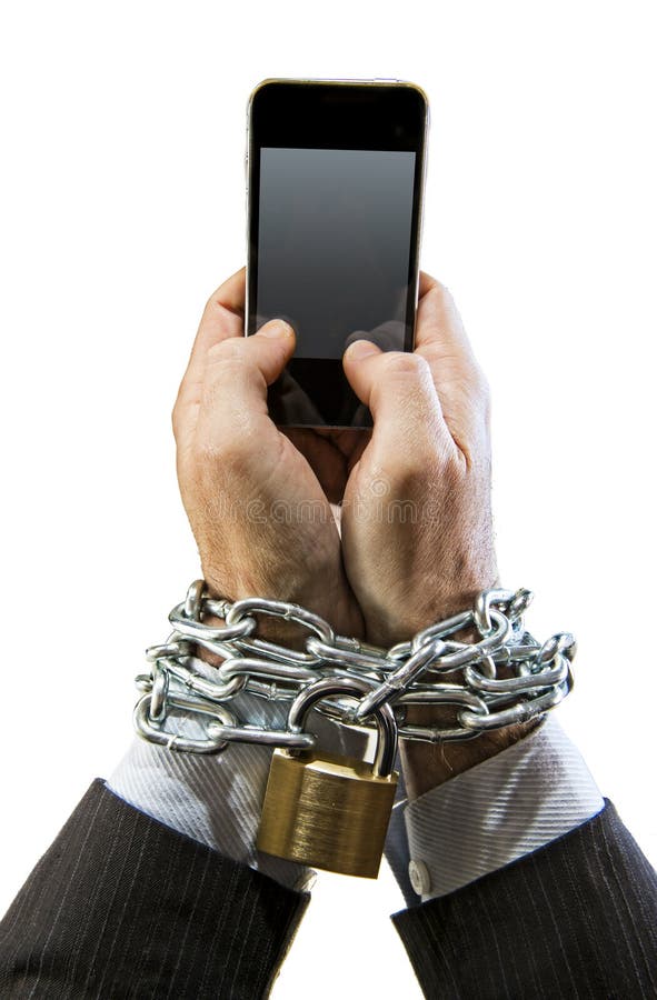 Hands of businessman addicted to mobile phone chain locked wrists in smartphone internet addiction and slave to online network addict concept isolated white background. Hands of businessman addicted to mobile phone chain locked wrists in smartphone internet addiction and slave to online network addict concept isolated white background