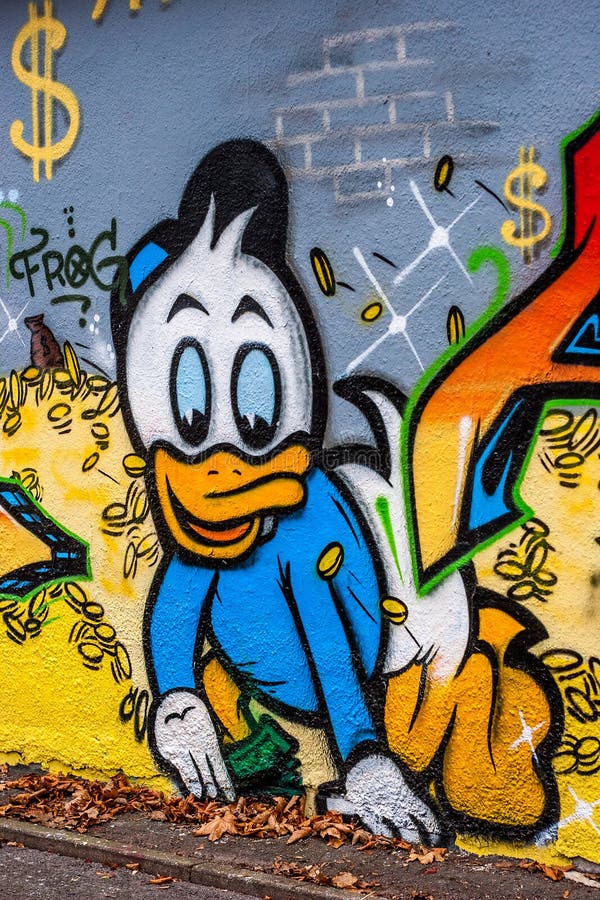 Street Graffiti of Tick, Huey Duck. The cartoon character was created in 1947 by Carl Barks and licensed by The Walt Disney Company. The triplets Huey, Dewey and Louie (German. Tick, Trick, and Track) are the sons of Donald's sister Della Duck. Street Graffiti of Tick, Huey Duck. The cartoon character was created in 1947 by Carl Barks and licensed by The Walt Disney Company. The triplets Huey, Dewey and Louie (German. Tick, Trick, and Track) are the sons of Donald's sister Della Duck.