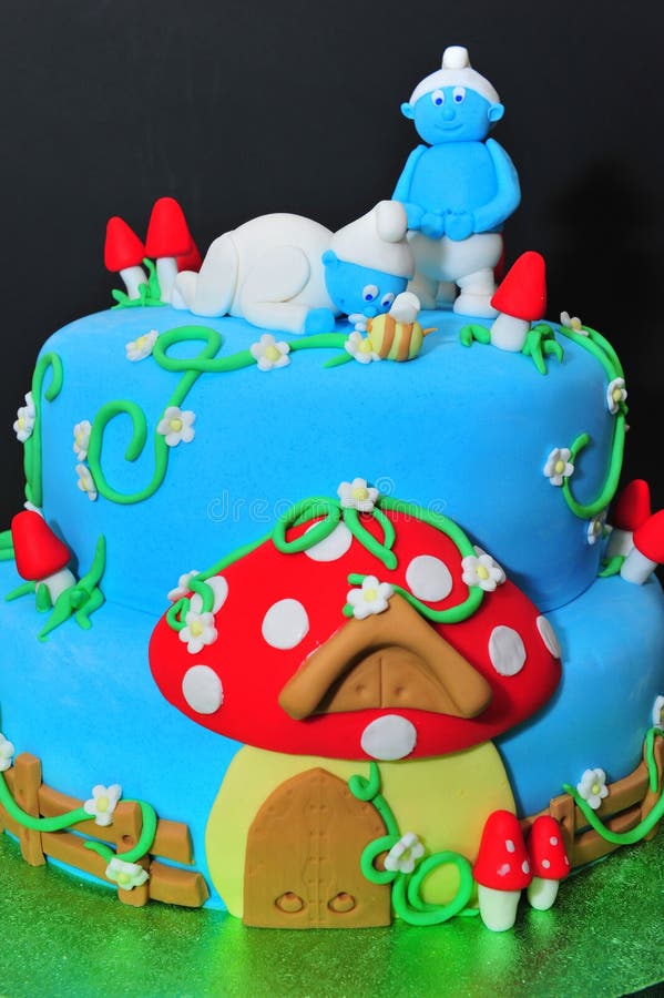 Beautifully crafted Smurfs theme cake. Beautifully crafted Smurfs theme cake