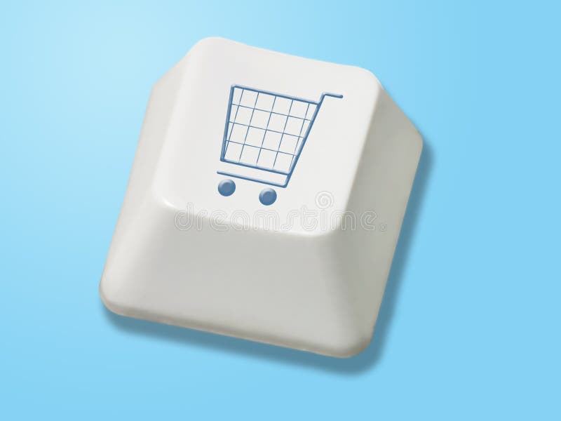 Computer key with shopping cart symbol over blue background. Computer key with shopping cart symbol over blue background