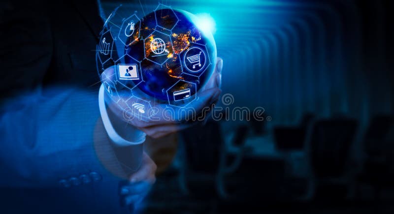 E-commerce concept with VR digital interface with icons of shopping cart and delivery truck and credit card with symbol of online purchase on internet.Earth at night was holding in businessman hands Elements of this image furnished by NASA