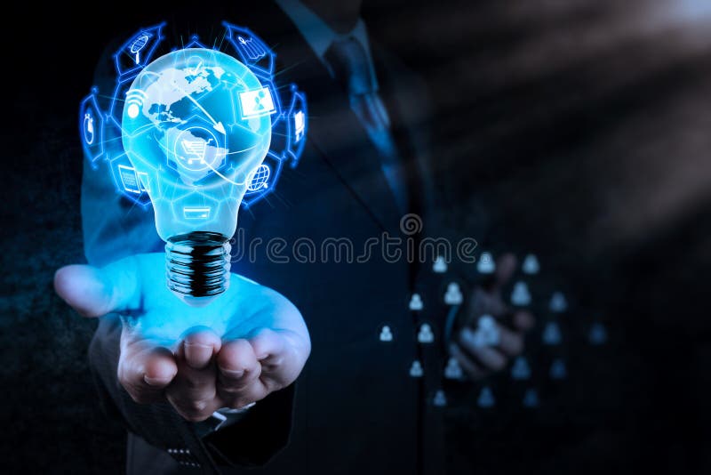E-commerce concept with VR digital interface with icons of shopping cart and delivery truck and credit card with symbol of online purchase on internet.Businessman hand shows Light bulb with planet Earth