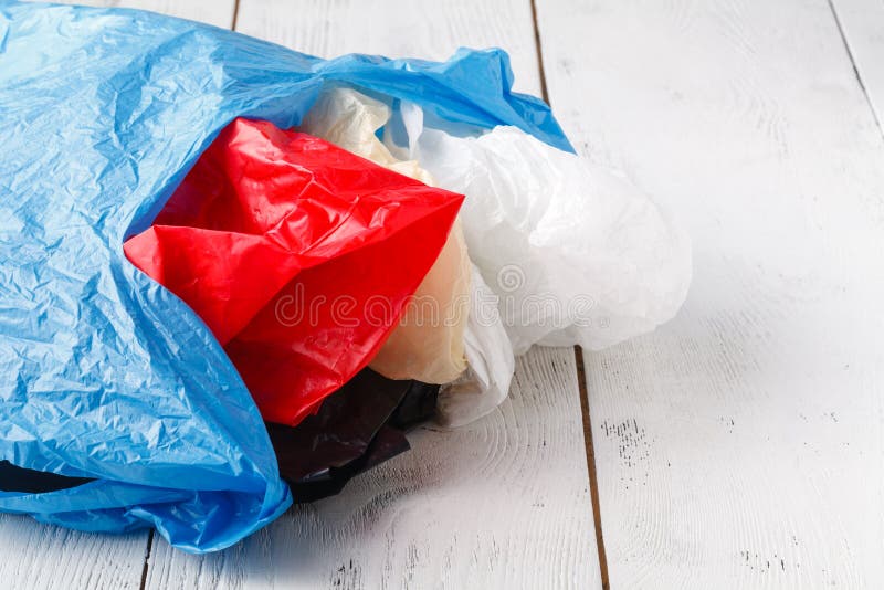 Plastic bag for shopping on rustic background. sustainable lifestyle concept. zero waste. plastic free items. Plastic bag for shopping on rustic background. sustainable lifestyle concept. zero waste. plastic free items