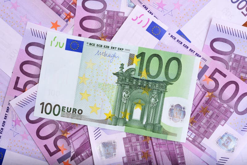 100 and 500 euro banknotes on the table. 100 and 500 euro banknotes on the table