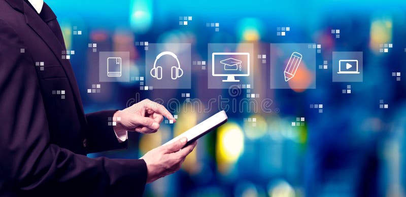E-learning concept with businessman using a tablet computer royalty free stock photo