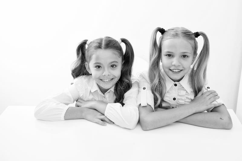 E learning. happy childhood od cute little girls. e learning for little girls isolated on white. royalty free stock photography E learning. happy childhood od cute little girls. e learning for little girls isolated on white. royalty free stock photography