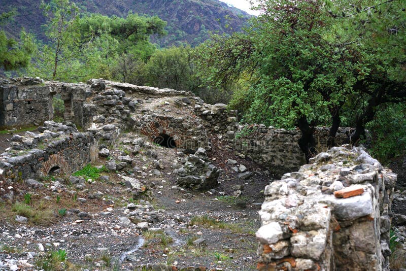 Cirali, Antalya/Turkey-January 01, 2018: Chimera, burning rocks are remarkable spot ot the trail of Lycian way near Cirali, Antalya. Cirali, Antalya/Turkey-January 01, 2018: Chimera, burning rocks are remarkable spot ot the trail of Lycian way near Cirali, Antalya